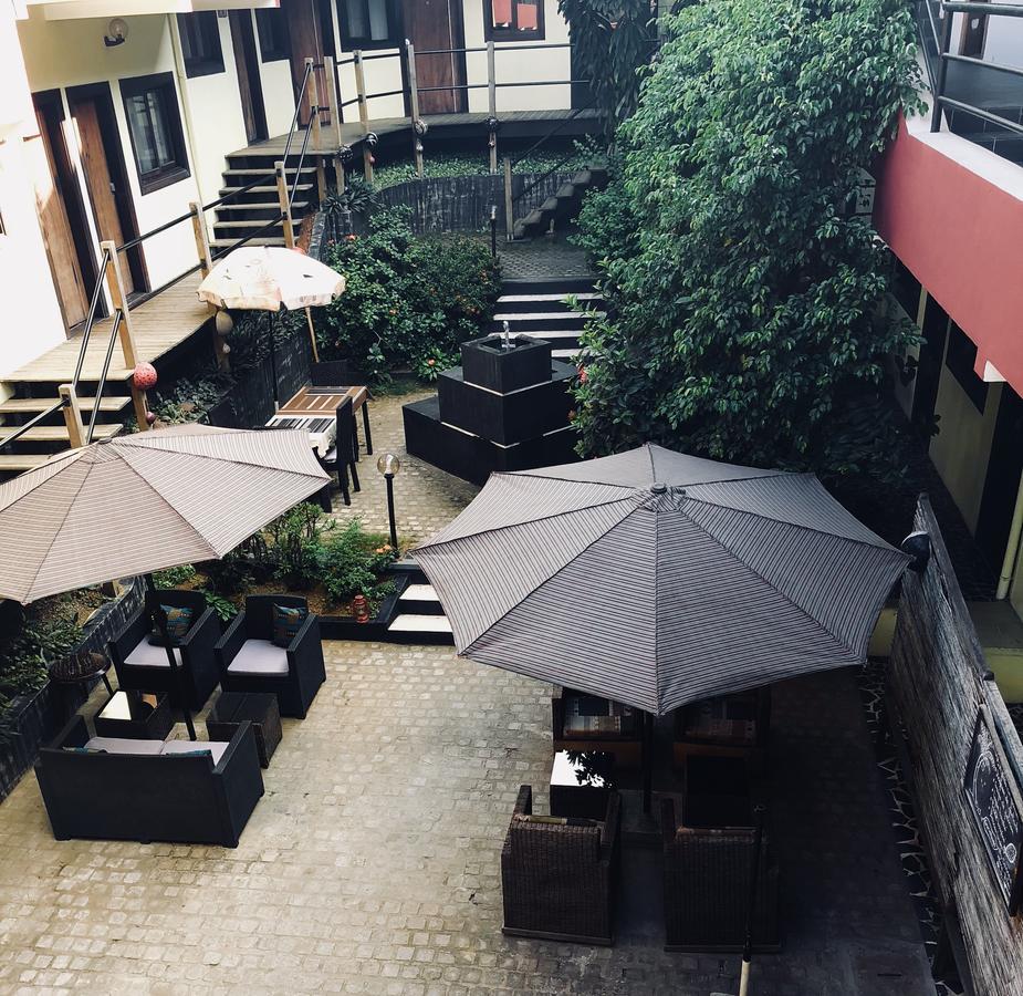 Detente Hotel Abidjan Bagian luar foto